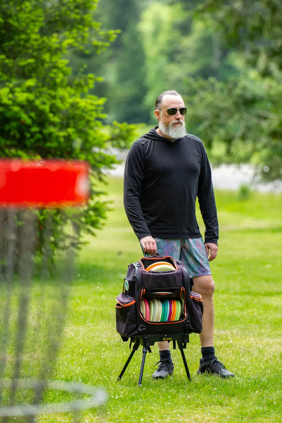 A disc golf bag standing on the Ryzer Go